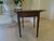 A fabulous Inlaid Pembroke Table with multiple wood species and inlays. With incredible fluted legs and spade feet for...