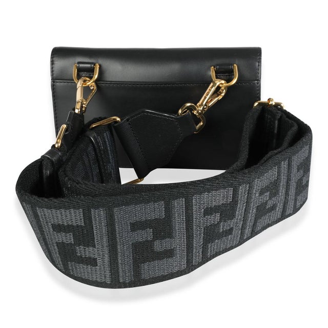 The Fendi Mini Flat Baguette makes for a perfect piece to carry for casual strolls, but can be dressed all the way up to a...
