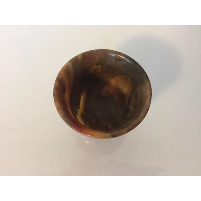 Antique 19th century Chinese carved agate footed wine cup. Highly figured stone. Measures 2" tall x 2 1/2" diameter. Good...