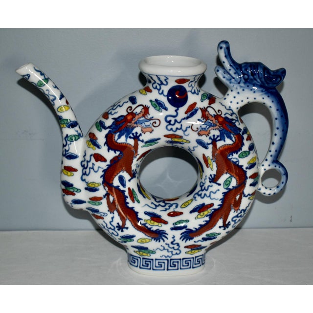 Vintage (1980's) Pitcher/Tea Pot is Chinese. Made of Porcelain. Multi-colored. Blue & White Dragon Phoenix with Donut...