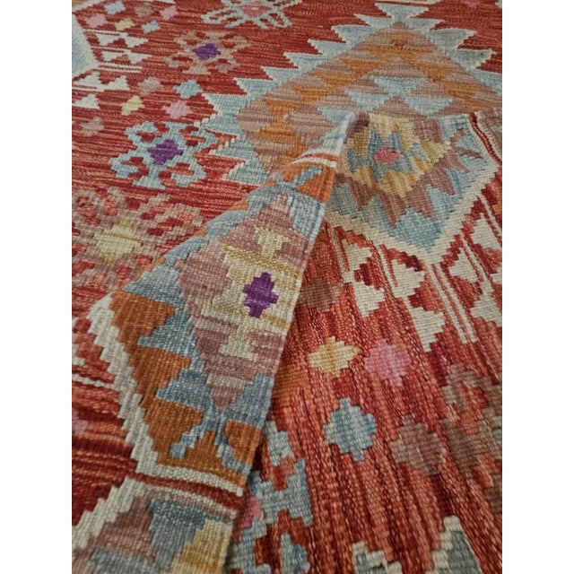 Boho Chic Wool Kilim Rug with Traditional Geometric Patterns For Sale - Image 3 of 11