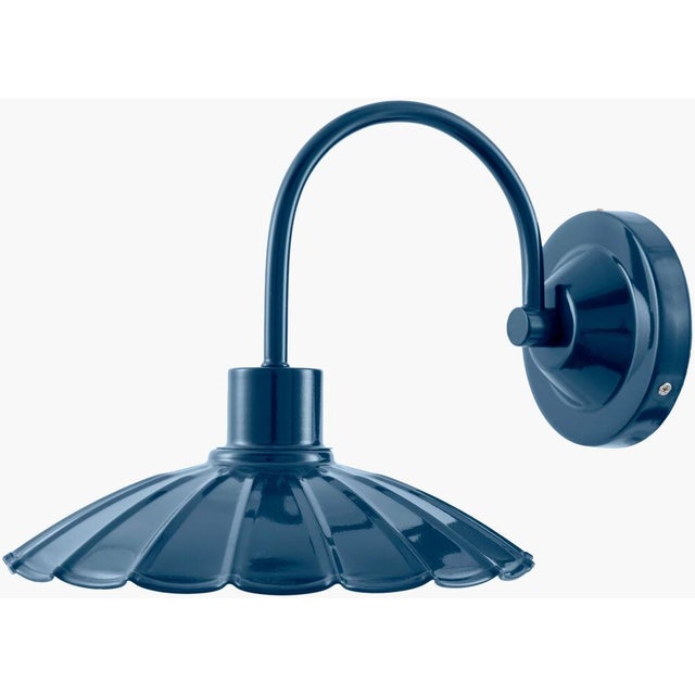 Illuminate your space with the rugged charm of the Pavona wall sconce lighting, where industrial meets rustic in a...