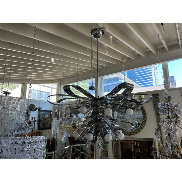 Italian Modern Chrome Chandelier By Gaetano Sciolari. Offered is an outstanding Italian mid century modern chandelier with...