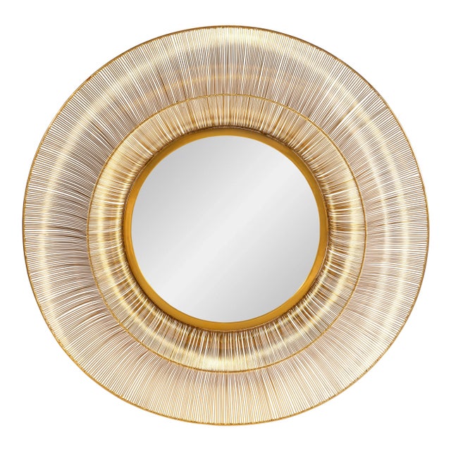 Antique brass metal wire frame with clear mirror Assembly Required? No Care Instructions: Dust with a soft, clean cloth...