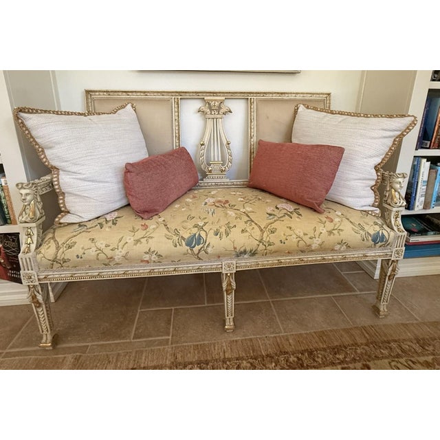 Feminine, Carved Details Showcase This Classic Settee. The faces of these women, the eagles and the laurel swags guarded...