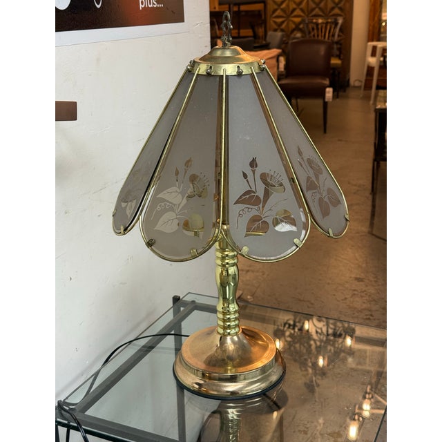 Design Plus Gallery presents the Vintage Floral Etched Glass Table Lamp by Marco Polo. The lamp has a brass-tone metal...