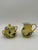 An Italian porcelain covered sugar bowl and creamer by Ginori 1735, decorated in the Oriente Italiano Citrino pattern....