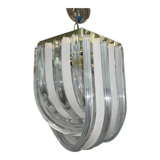 1970s Modern Abstract Lucite Frosted and Clear Ribbon Chandelier With Brass Frame For Sale