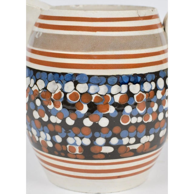 English Pearlware Mocha Pottery Jug with Cat’s Eye Polka Dot Decoration Circa 1810–1820 This early nineteenth-century...