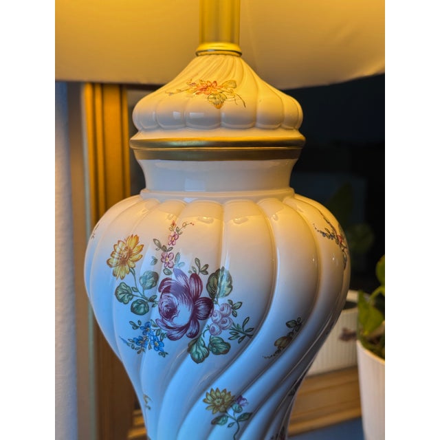 Bring classic English elegance into your space with this stunning vintage "Garden of Royalty" porcelain table lamp....