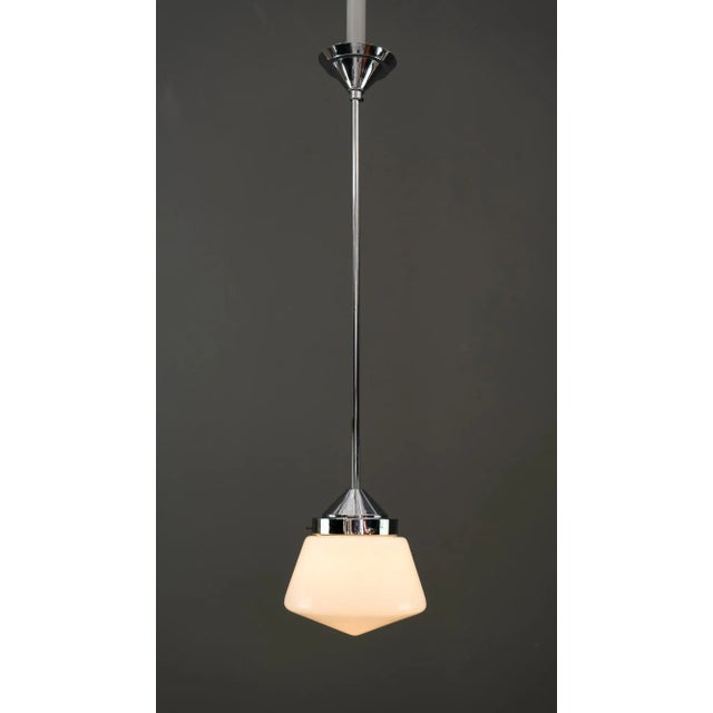 Art Deco Bauhaus pendant, Germany, circa 1920s Brass chromed Opal glass. European Plug (up to 250V).The wiring of this...