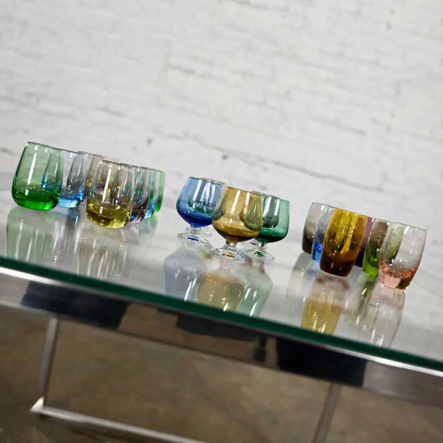 Fabulous vintage set of 21 blown glass multi-colored small cocktail snifters, cordials, or shot glasses in three different...