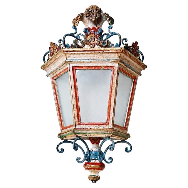 A rare Italian Hollywood Regency lantern wall light dating from the 1980s, preserved in exceptional New Old Stock...