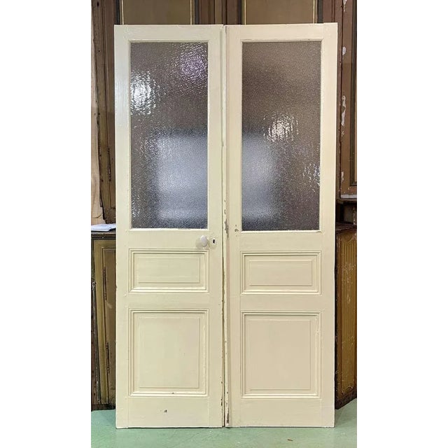 Double glazed interior door in fir from the early 20th century - L=1m23.5, H=2m27, D=3.5cm.