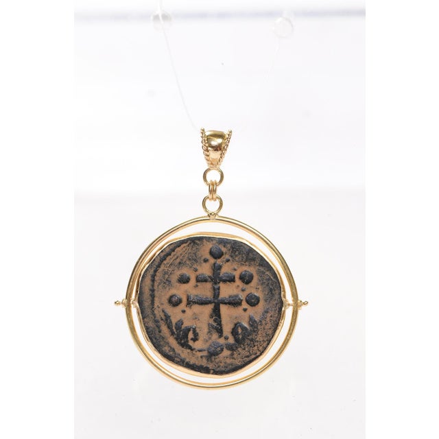 Byzantine [coin] Pendant w/ 18K Gold Trim from Byzantine era. The Byzantine Era ran from the 300s to the fall of...
