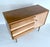 Mid century scandinavian style cabinet / sideboard, two-tone contrasting wood veneer, 3 drawers with slanted facade and a...