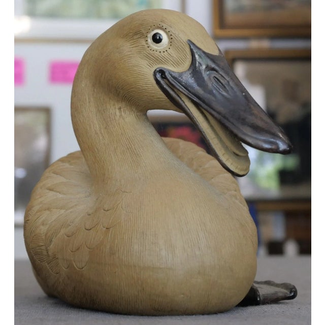 Up for sale is a Vintage Circa 1970 Chinese Shiwan Pottery Duck Laying Down Figurine! It measures 4” tall and 7 7/8” long....