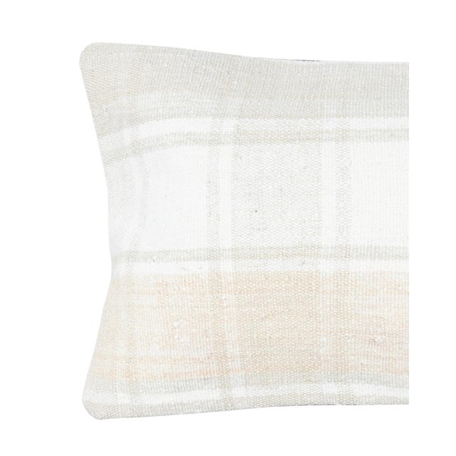 Add a touch of history and warmth to your space with this vintage handmade natural hemp kilim cushion cover. Crafted from...