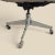 A vintage 1970s desk chair with a molded plastic shell, chrome and steel base, and faux-leather upholstered seat. The...