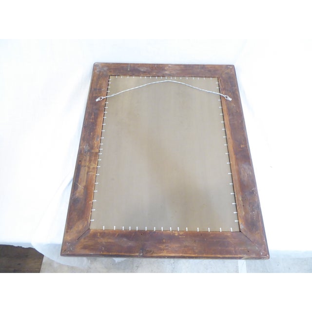 This 19th Century wide molding silverleaf mirror has a dull tone silver cove and measures 31"H x 24.5"W.
