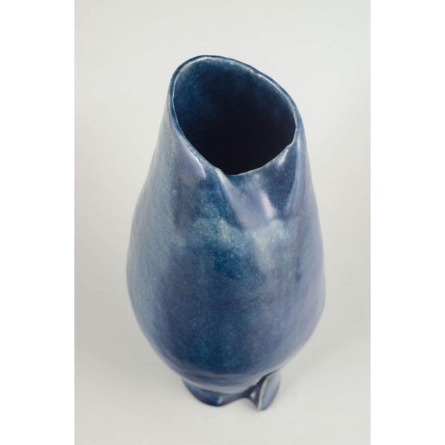 European studio ceramicist, unique vase, 1987. Sculptural stoneware vase with a deep blue, subtly variegated glaze and an...