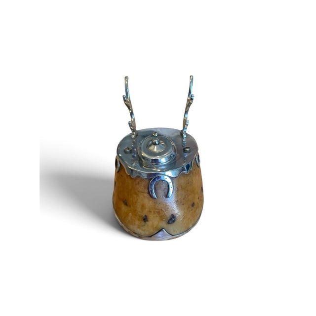 An exceptional, finely crafted late 19th-century horse hoof inkwell produced by the world-renowned British natural history...