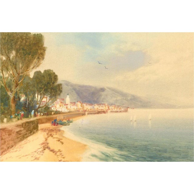 This is a lovely 20th century watercolor of a coastline under a blue sky. The size is roughly 10.5 inches x 7 inches....