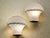Add a touch of retro elegance and exclusivity to your spaces with this pair of Murano glass wall sconces. Featuring an...