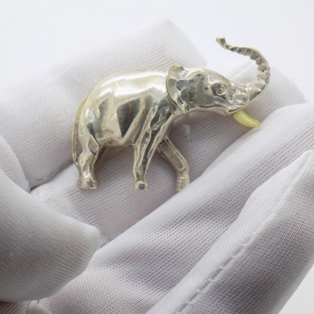 Compact vintage miniature depicting an elephant, handcrafted in Italy between the 1960s and 1970s in genuine sterling...