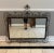 Rare vintage French large scale wrought iron mirror with a beveled edge design. Featuring an exquisite scrolling whimsical...