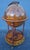 1960's Mid Century World Globe Dry Bar. Stunning and artistic rolling Globe with interior storage.