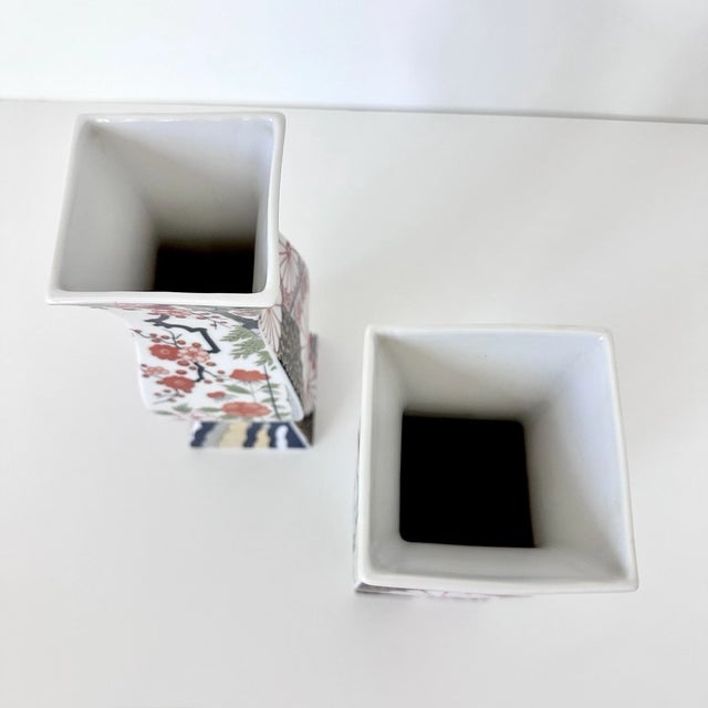 Beautifully decorative and full of classic Japanese elegance, this **set of two Vintage MCM Japanese Imari porcelain...