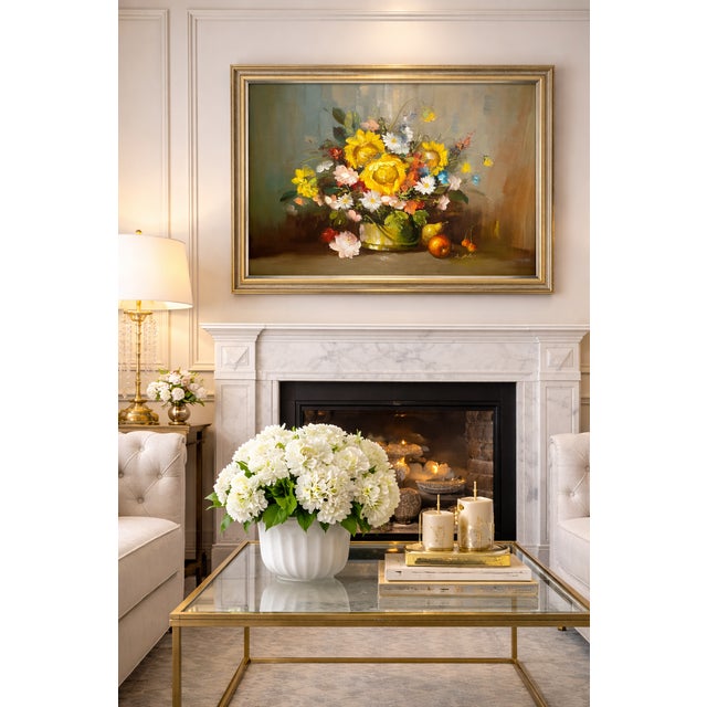 An elegant vintage still life oil painting featuring a lush floral arrangement of golden yellow roses, soft pink blossoms,...