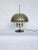 Adjustable table lamp designed in 1962 by Elio Martinelli and produced in Spain under license by Metalarte. Double shade...
