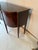 This is a beautiful bench made mahogany sideboard. It has very nice inlays on the top as well as each drawer and cabinet...