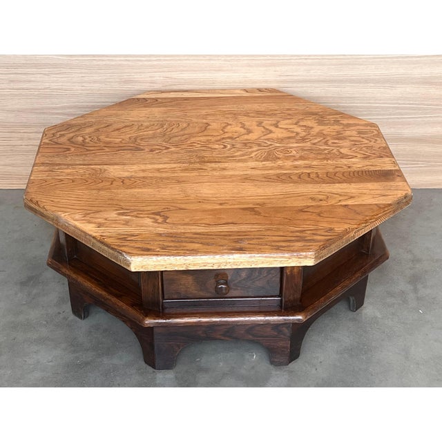 Original antique table, octagonal in shape, very rare in design and color. It has two drawers wood hardware.