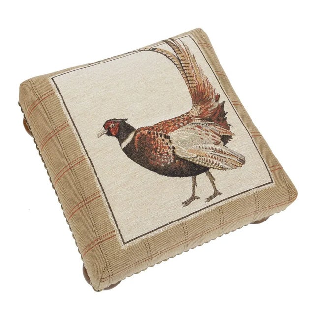 Tapestry Footstools with bun-feet and traditional-style studding.