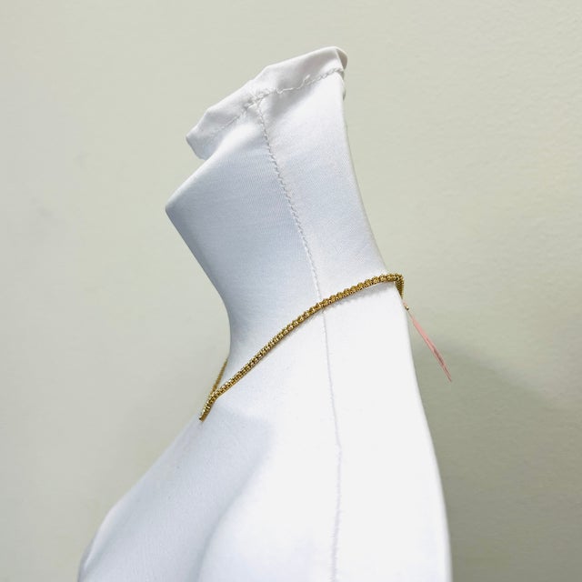 Beautiful 10.10 ct. white diamond rounds. Total of 147 stones. Handmade in 14k yellow gold. Length is 16".