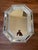 Vintage Venetian/Murano-style octagonal wall mirror with a faceted clear glass surround, engraved floral detailing, and...