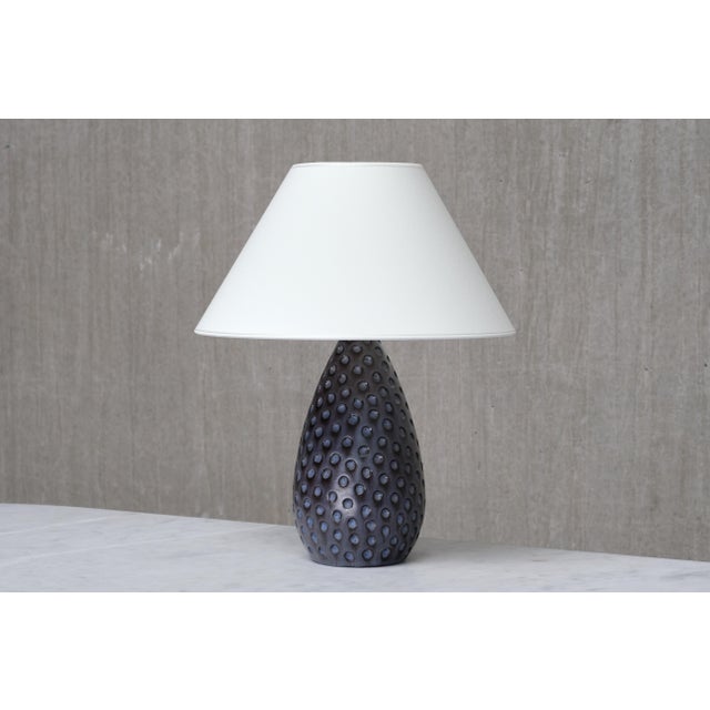 This very rare table lamp was designed by Helge Østerberg and made in his own studio in Virum, Denmark in the 1950s. The...
