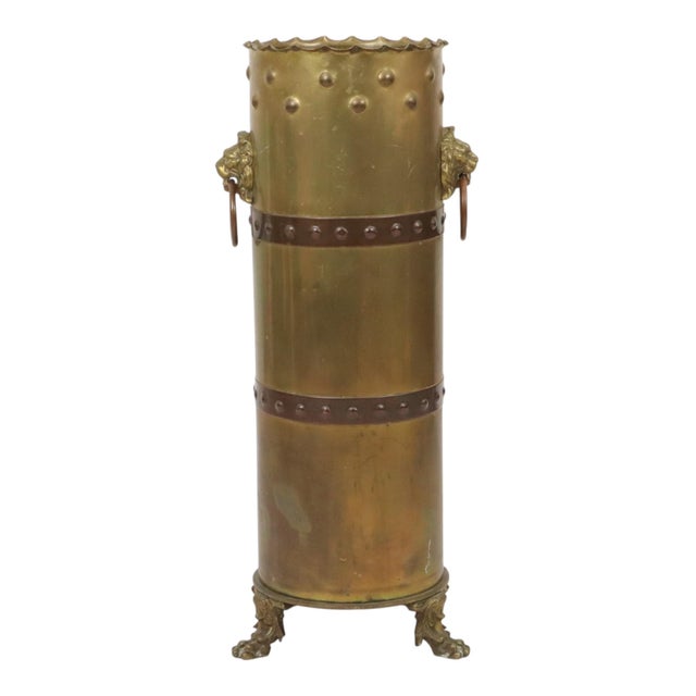 A very rare and unique umbrella stand crafted from three german artillery shell casings from world war i; marked "gfsp"...