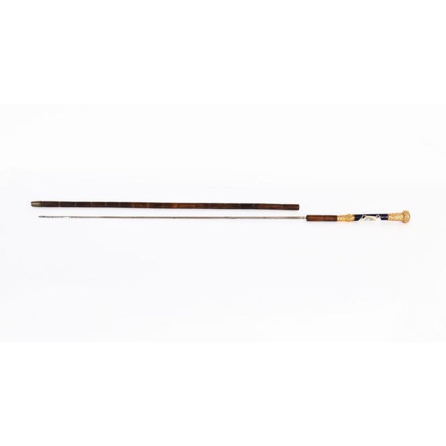 This is a fine antique French gold plated and Sevres porcelain walking stick sword / cane, circa 1880 in date. It features...