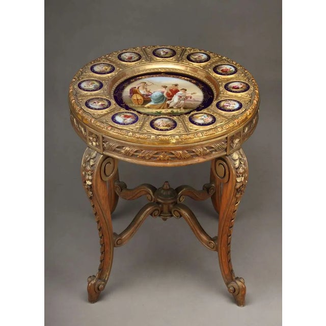 An exceptionally decorative late-19th-century Austrian gueridon or occasional table, circa 1880, featuring a remarkable...