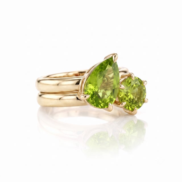 Infuse your look with fresh, vibrant energy using the lively lime-green hues of natural peridot. The contrasting pear and...