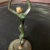Mid-century and made in Israel, this small and lightweight metal sculpture of a woman holding a bowl is very striking and...