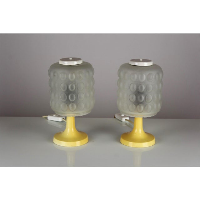 Original pair of table lamps manufactured by Elektroinstala Děčín, Czechoslovakia, during the 1970s. The lamps feature...
