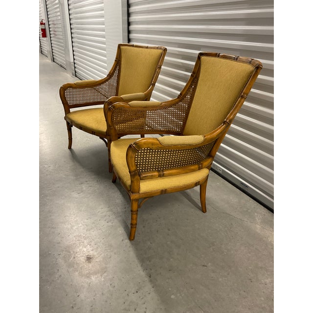 A stunning pair of vintage lounge chairs featuring sculptural beechwood frames with a distinctive bamboo-turned finish....