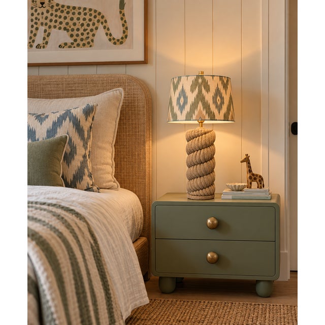 Elegant, rustic and glamorous. The ceramic pottery base has soft curves to balance the nautical rope design.