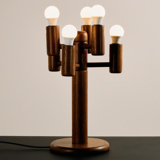 Temde Leuchten oak table lamp from the 1960s.The lamp has six sockets and the wooden surface is in good vintage condition....