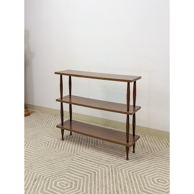 This neat little vintage mid-century modern 3-tier shelf is a practical and good-looking small bookcase that punches above...